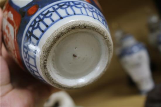 A pair of Chinese famille rose vases, a pair Samson vases and cover, and an Imari vase and cover smallest 15cm, tallest 22cm